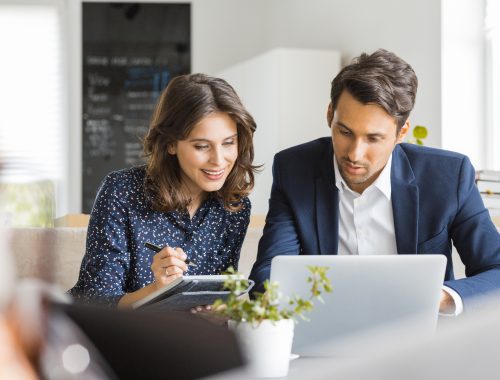 Business People Working Together At Coffee Shop