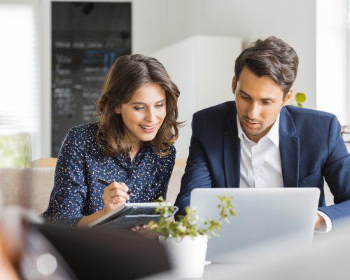 Business People Working Together At Coffee Shop